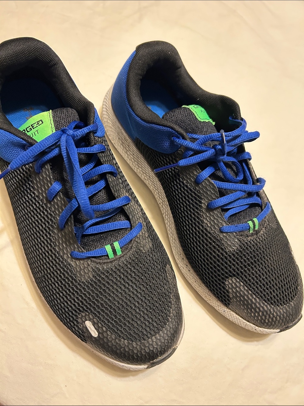 Under Armour Men's Black Athletic Shoes with Blue Laces